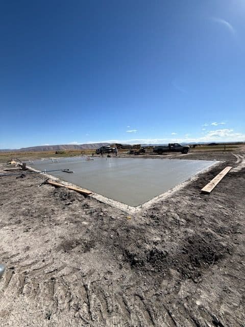Project Laying Fresh Concrete Pads Across Scenic Landscapes image