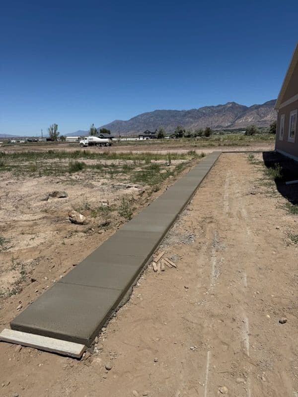 Gallery photos for Concrete Sidewalks Poured All the Way Around This Home: Image #1