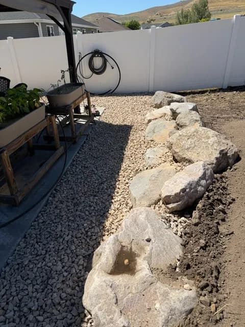 Project Backyard Gets Structure With a Retaining Wall and Concrete Patio image