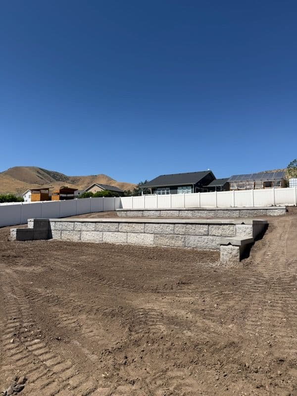Gallery photos for Backyard Gets Structure With a Retaining Wall and Concrete Patio: Image #3