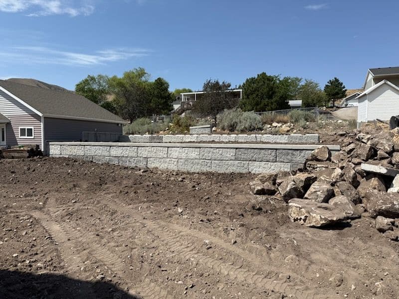Durable Backyard Makeover with Retaining Wall